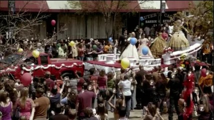 Damon jumps in front of Bonnie and waves to Elena