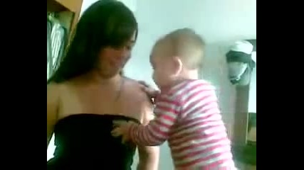 Baby touching boobs