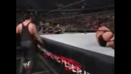 Undertaker owns a fan _your momma sucks!_