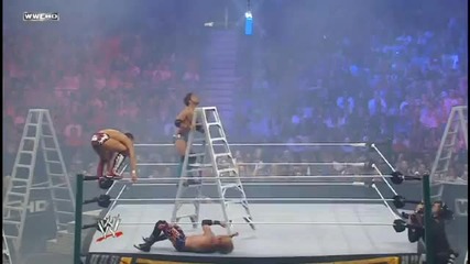 Daniel Bryan hits a Missile Dropkick on Justin Gabriel in a Ladder