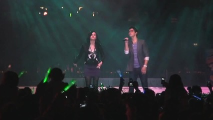 Demi Lovato and Joe Jonas sing Make a Wave live in Epcot at Walt Disney World 