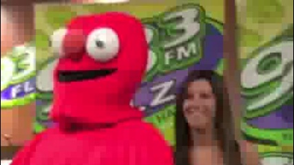 Ashley Tisdale meets Elmo