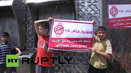 State of Palestine: See orphans attempt to smash down Bank of Palestine doors