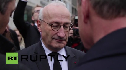 Germany: Berliners pay tribute to Paris attack victims outside French embassy
