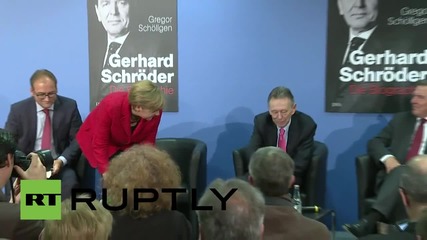 Germany: Angela Merkel presents biography of her predecessor Gerhard Schroder