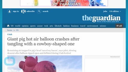 Giant Pig Hot Air Balloon Crashes After Tangling With a Cowboy-shaped One