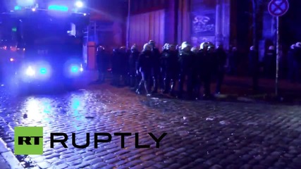 Germany: Riot police use water cannon to extinguish anti-fascist fire