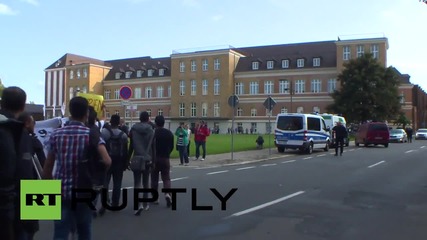 Germany: Protesters march for refugee rights as Interior Minister arrives in Magdeburg
