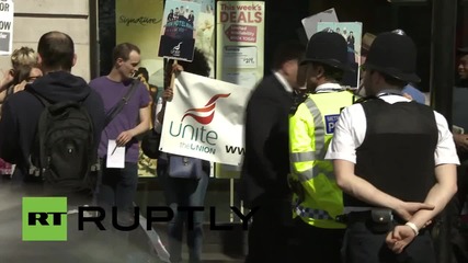 UK: 'We're not lovin' it!' McDonald's workers protest for higher pay