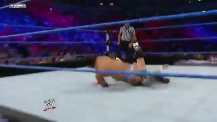 Tyson Kidd dropkicks Justin Gabriel in mid air