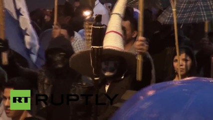 Honduras: US flag BURNS at torch-lit anti-corruption rally in Tegucigalpa