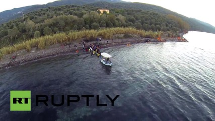 Greece: See DRONE footage of local fisherman guiding refugee boat to Lesbos