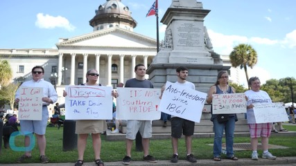 Woman Removes Confederate Flag From SC Statehouse