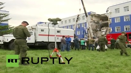 Russia: Firefighters battle to find survivors from Omsk barracks