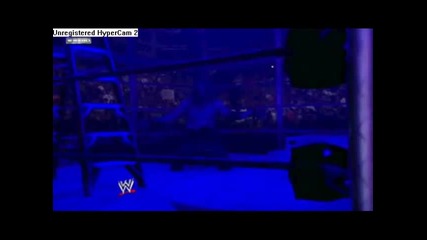 Undertaker Chokeslams Edge to the through ring