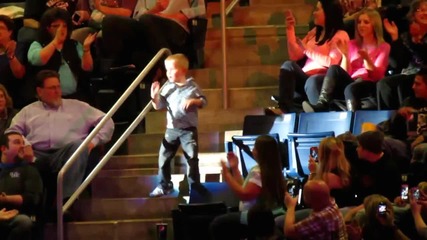 Little boy dancing at the Rascal Flatts concert