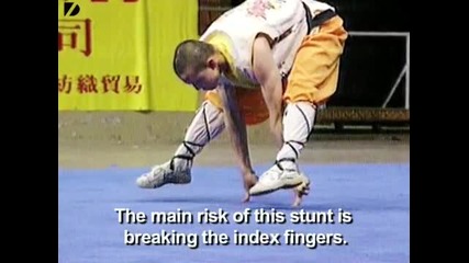 Shaolin Monk Balances On 2 Fingers2 