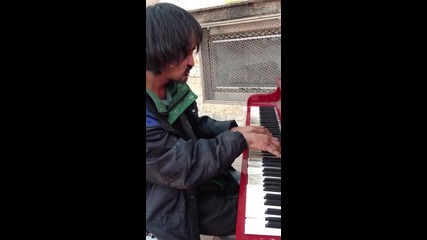 Man on the street plays beautifully