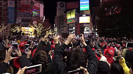 Japan: Crowds gather to welcome the new year at Tokyo's Shibuya Crossing
