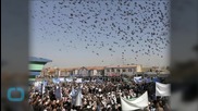 Moroccan Police Try to Block Burial Prominent Islamist's Widow as Thousands Protest