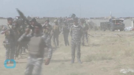 Enemy Fire, Booby-traps Delay Iraqi Forces' Advance in Tikrit
