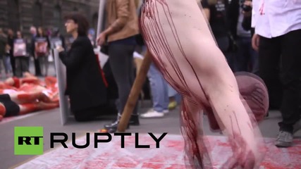 France: 'Blood' covered vegans enact 'human slaughter' in Paris