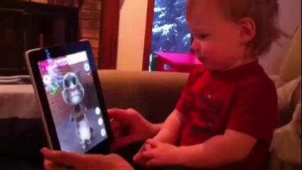 Baby talking to Talking Tom ipad