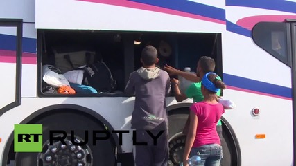 Serbia: Buses take refugees to Croatia border crossing