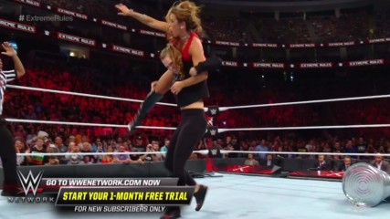 Ronda Rousey leaps from her ringside seat to attack Mickie James: WWE Extreme Rules 2018 (WWE Network Exclusive)