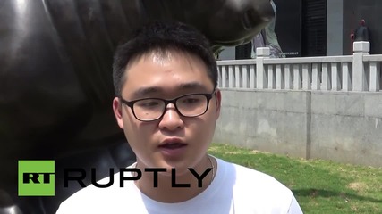 China: Xiamen's answer to the Wall Street Bull? Residents pray for market upturn