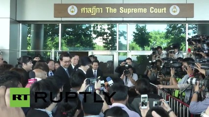 Бившият министър-председател на Тайланд Инглук Шинаватра пристига в съда в Банкок