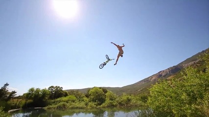 Huge Bike Jump into a Pond 35 feet in the air 