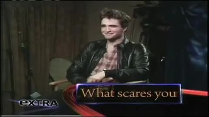 Robert Pattinson interviewed by Mario Lopez for Extra 