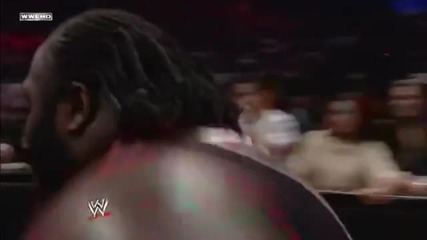 Mark Henry smashes Big Show on the barricade