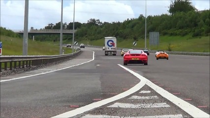 50 Supercars acclerating M6 Toll Supercar Charity Event