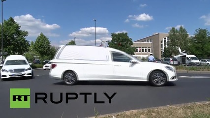 Germany: White hearses carry Germanwings student victims' bodies home