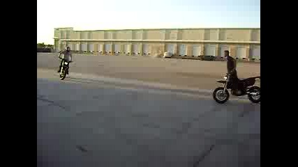 Supermoto burnout in circles around a pole while chasing my buddy on a 50.
