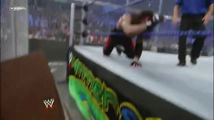 Super Chokeslam through two Tables