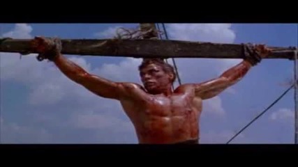 Епична снимка на Гибсън разпънат на кръста от филма Киборг (1989)