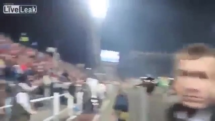 Ground Level View of Football Riot with Police started with one man