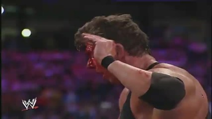 Vince Mcmahon does a Leg Drop off a Ladder through the Announcer Table