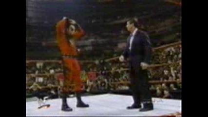 Kane removes mask