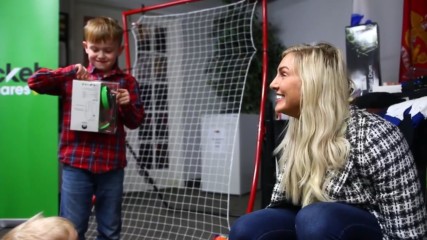 Charlotte Flair and Cricket Cares surprise a deserving military family with gifts and smiles