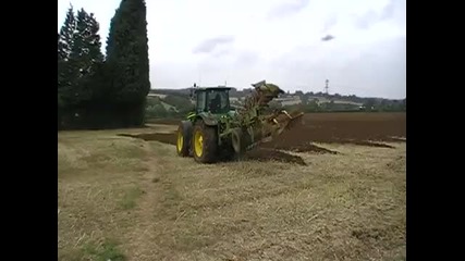 John Deere 7930 with 7f rev plough
