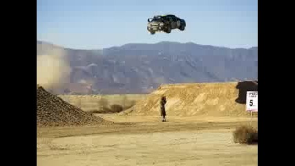 Ken Block jumps with his rally car 171 feet 