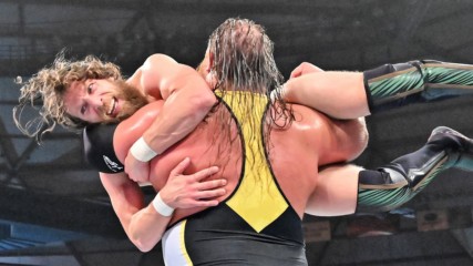 Heavy Machinery overpower Daniel Bryan with a stalling suplex: WWE Stomping Grounds 2019 (WWE Network Exclusive)