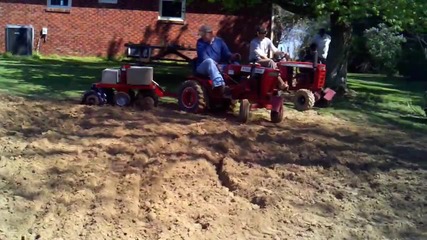 Wheel Horse garden tractors working