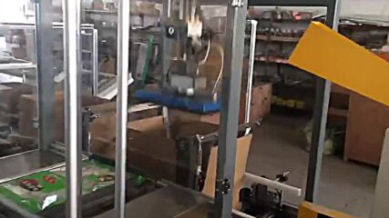 Автоматична система за поставяне на продукта в кашон