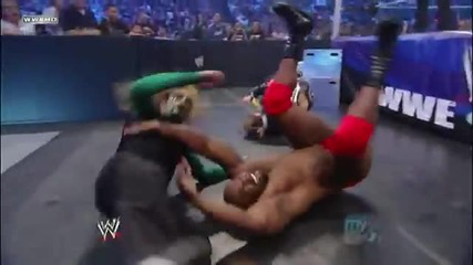 Slingshot Plancha on Ezekiel Jackson&brian Kendrick