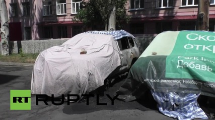 Ukraine: Donetsk protesters burn OSCE vehicles